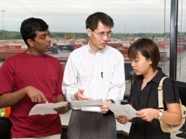 Photograph of lead professor and students