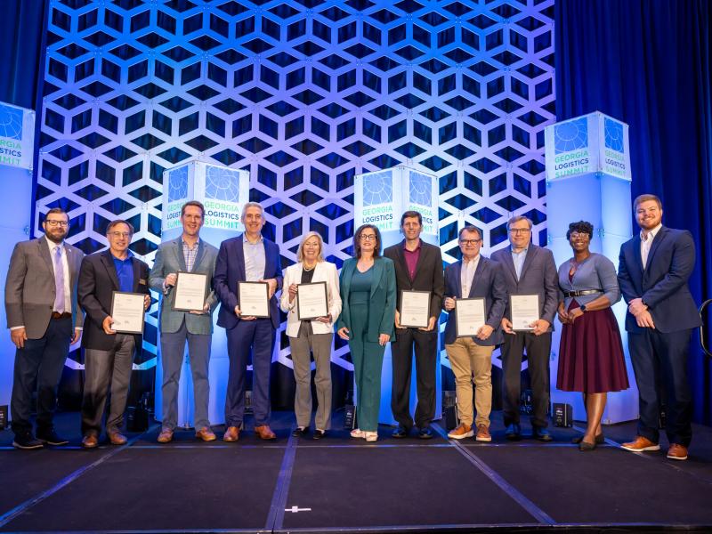 Members of the Georgia Center of Innovation – Logistics Advisory Board gathered at the 2025 Georgia Logistics Summit, where each received a personal note of recognition from Governor Brian Kemp for three years of dedicated service. Their collective efforts have advanced freight and logistics across Georgia—strengthening collaboration between industry, government, and academia to drive the state’s economic growth.